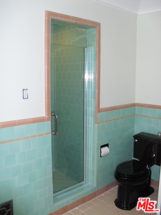 9963 Durant Drive Beverly Hills, CA 90212 - Photo 19 of 23 a bathroom with a toilet and a shower