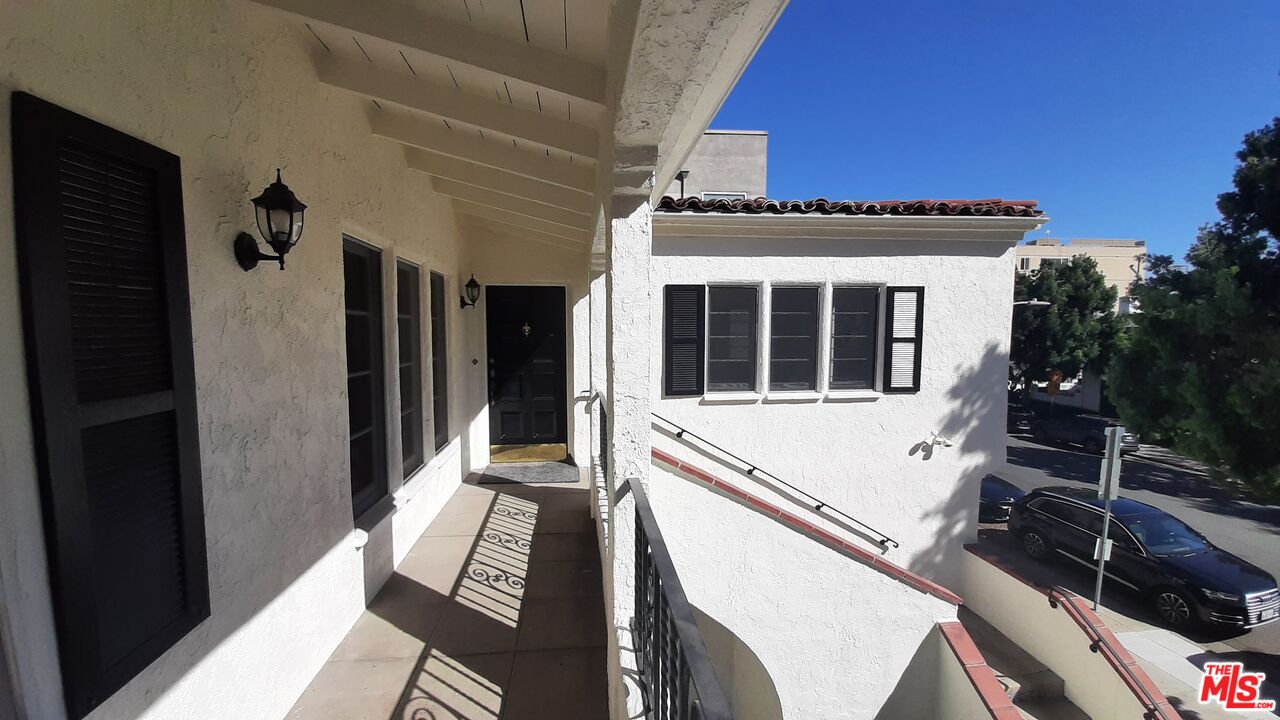 9963 Durant Drive Beverly Hills, CA 90212 - Photo 3 of 23 a view of house with deck