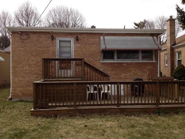 2229 Keystone Avenue North Riverside, IL 60546 - Photo 9 of 9 a view of a house with wooden deck and a yard