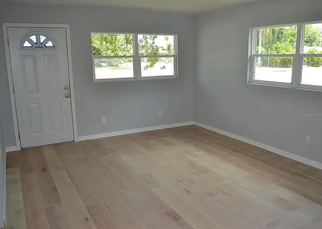 an empty room with a window