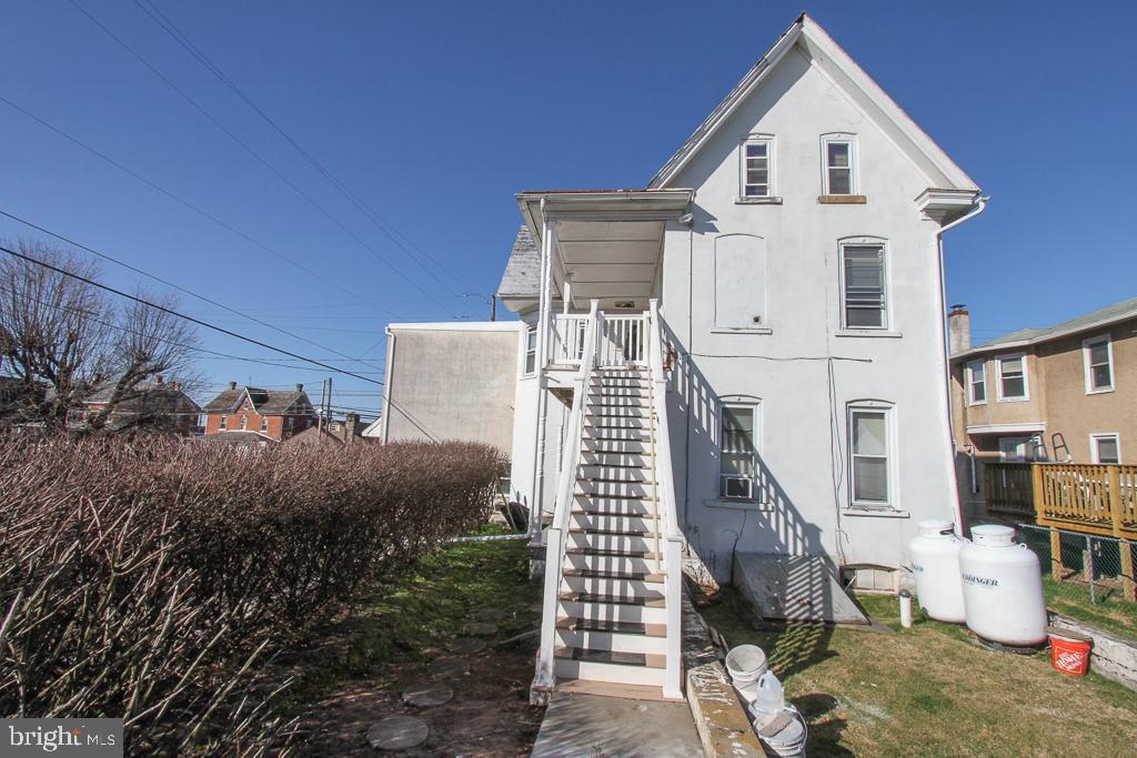 700 Main Street Red Hill, PA 18076 - Photo 14 of 14 a view of a house with backyard and wooden fence