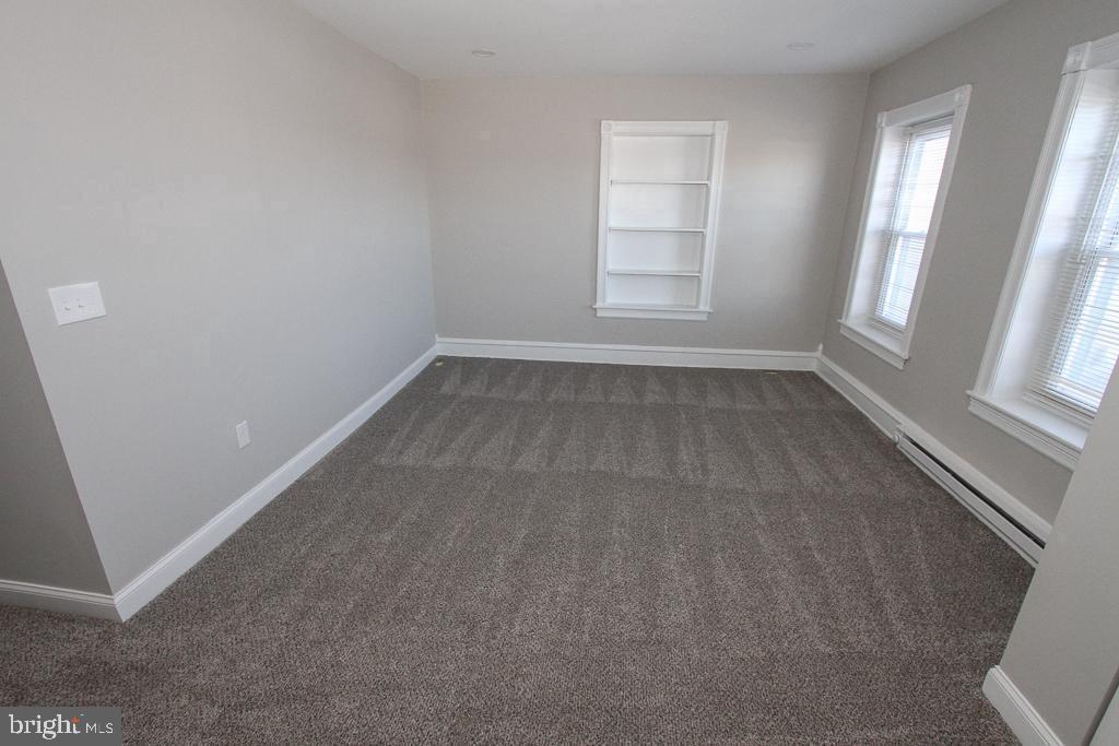 700 Main Street Red Hill, PA 18076 - Photo 6 of 14 an empty room with windows