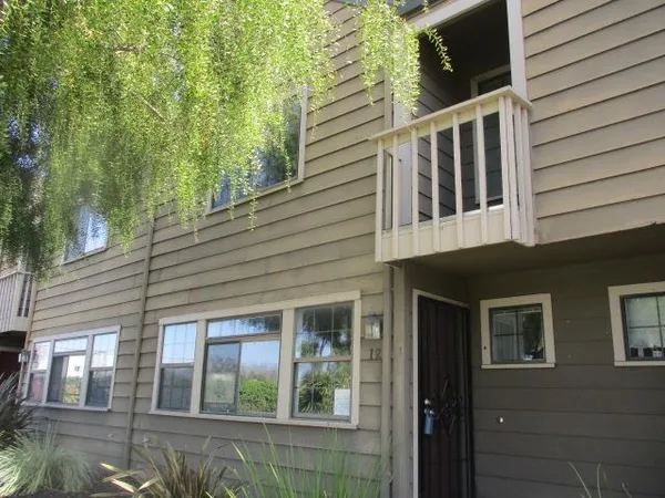 a view of a house with a balcony