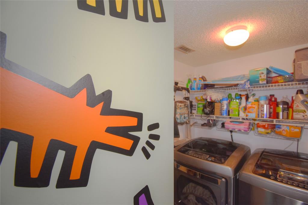 2238 North Cypress Bend Drive, Unit 902 Pompano Beach, FL 33069 - Photo 32 of 41 laundry in unit