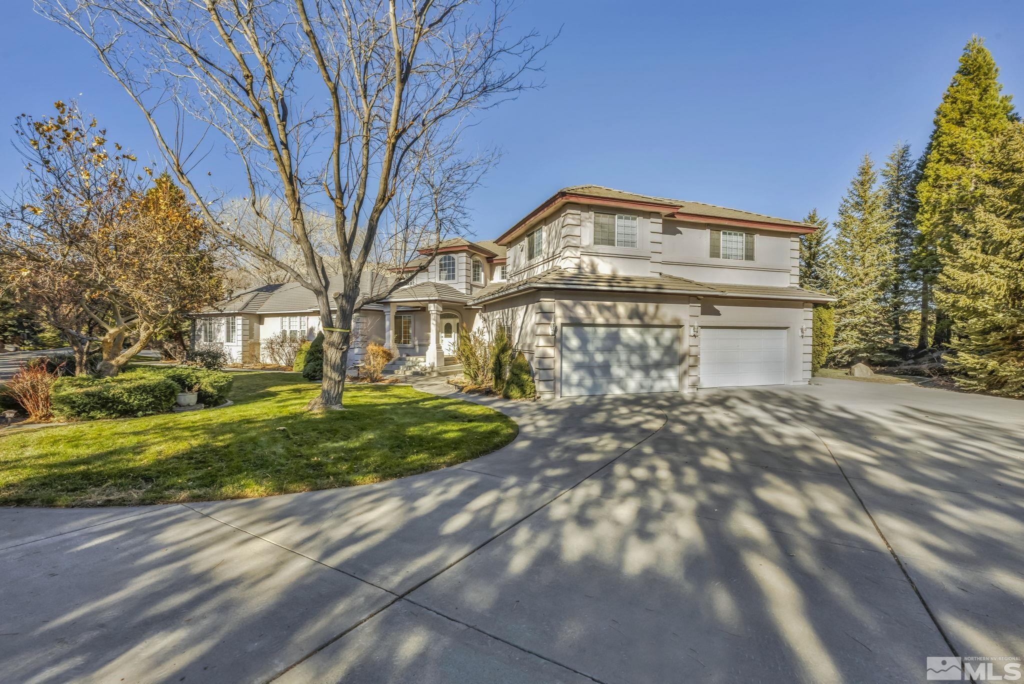 15 Hidden Lake Drive Reno, NV 89521 - Photo 12 of 40 a front view of a house with a yard