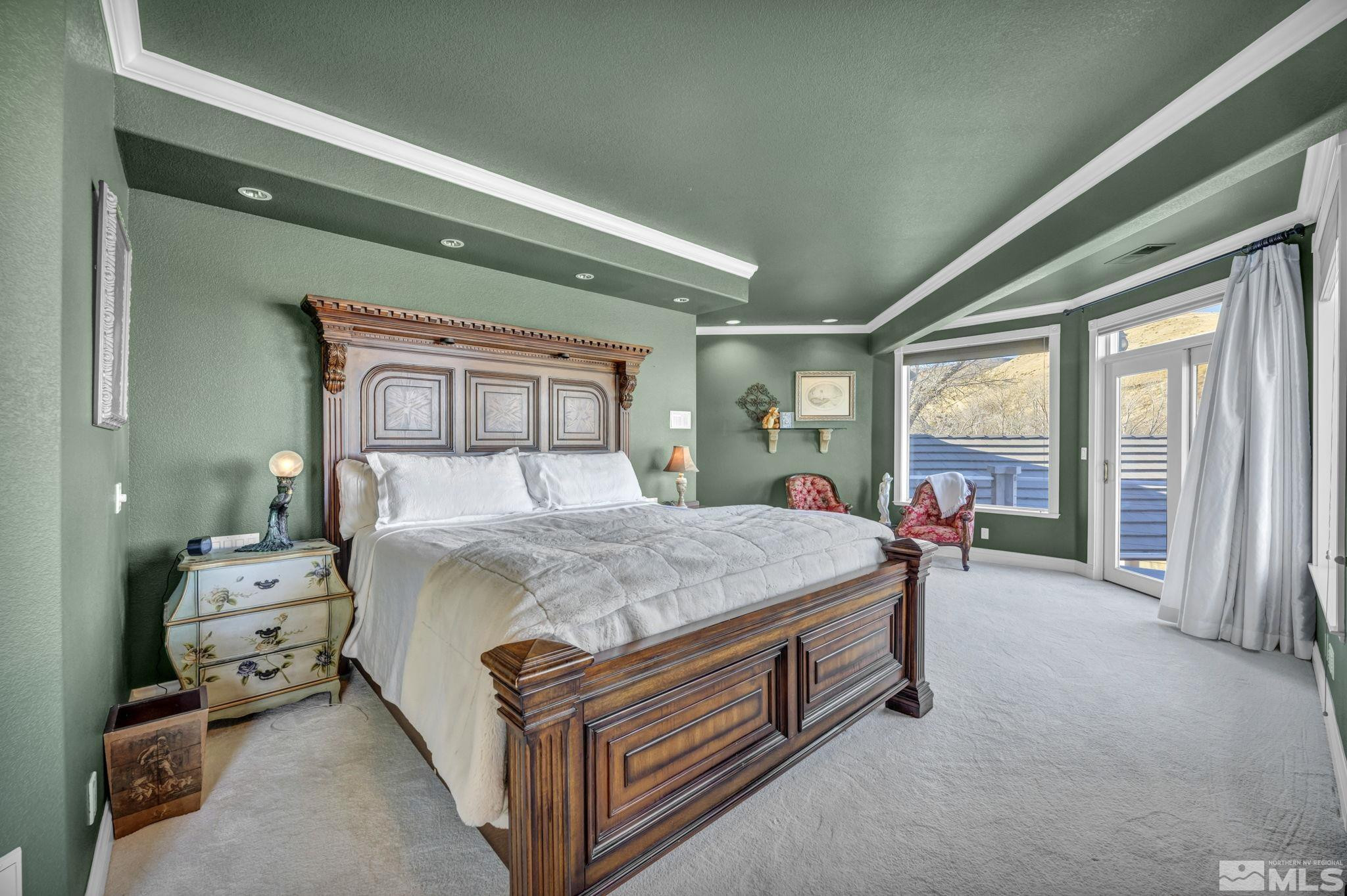 15 Hidden Lake Drive Reno, NV 89521 - Photo 15 of 40 a bed sitting in a bedroom next to a window