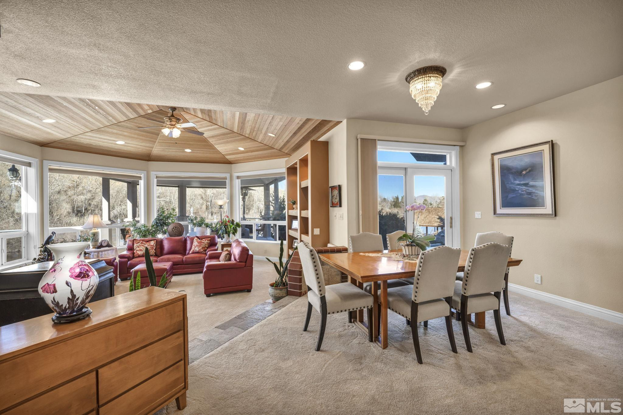 15 Hidden Lake Drive Reno, NV 89521 - Photo 19 of 40 a view of a dining room with furniture window and outside view