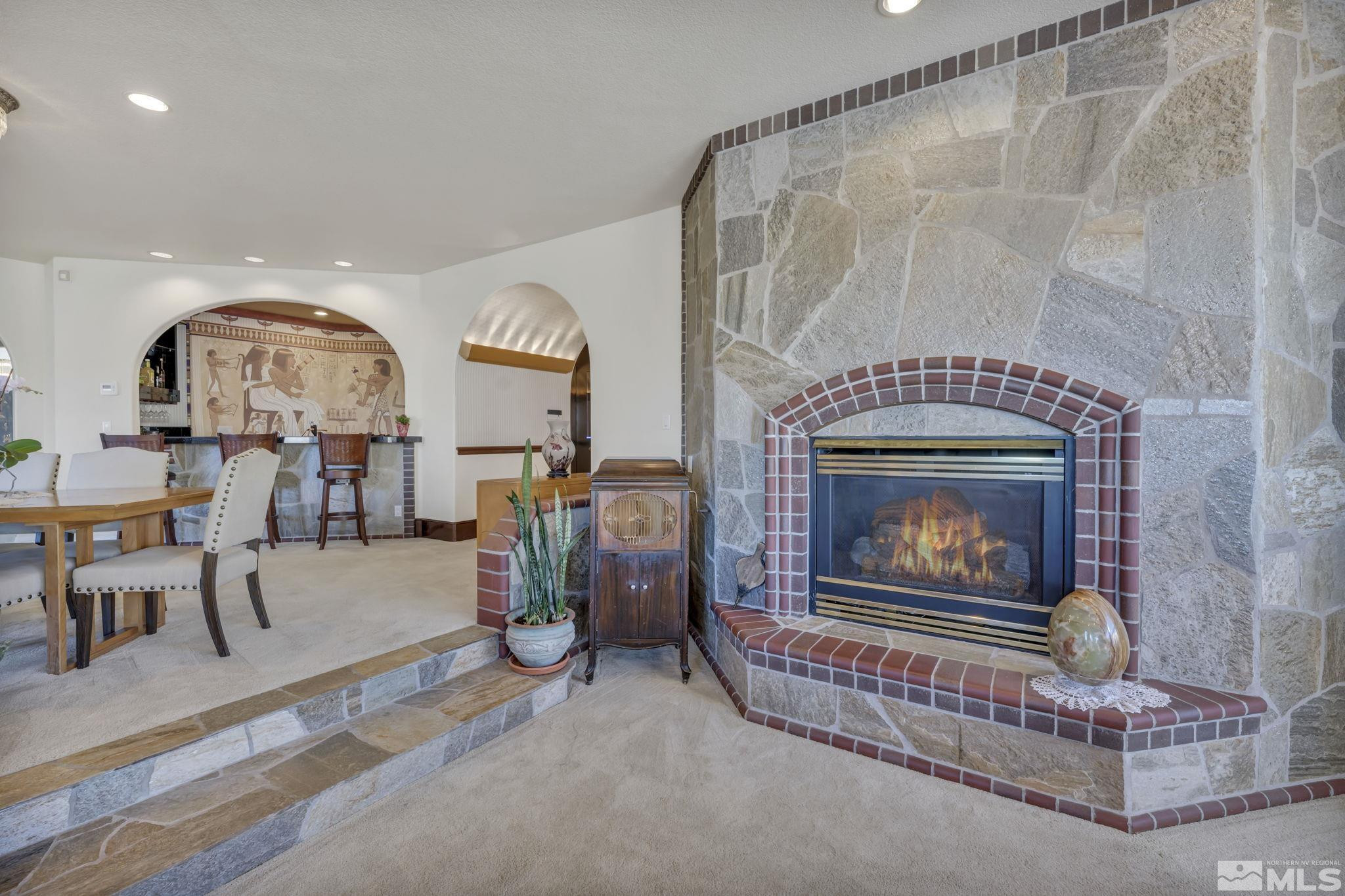 15 Hidden Lake Drive Reno, NV 89521 - Photo 20 of 40 a living room with furniture and a fireplace