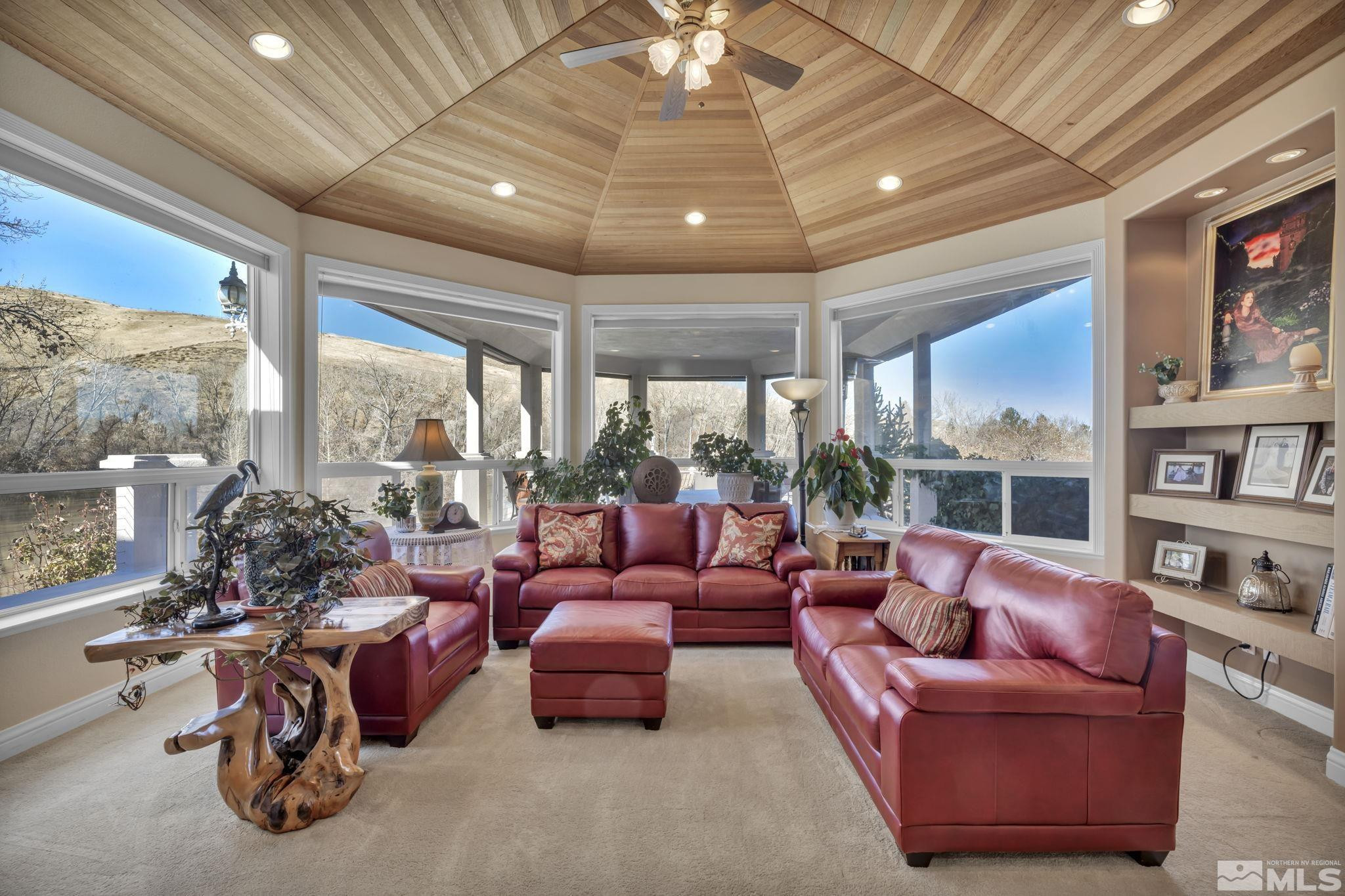 15 Hidden Lake Drive Reno, NV 89521 - Photo 2 of 40 a living room with furniture a chandelier