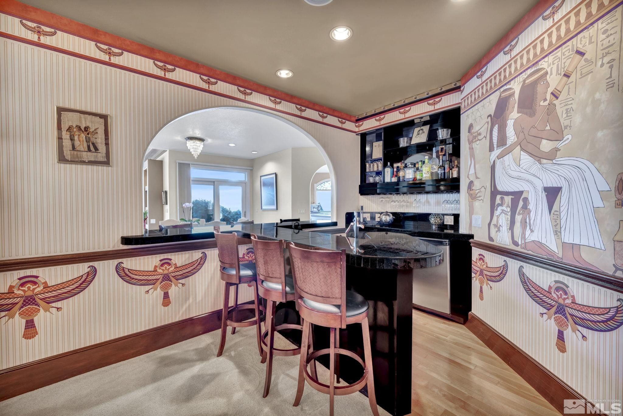 15 Hidden Lake Drive Reno, NV 89521 - Photo 22 of 40 a dining hall with stainless steel appliances granite countertop a stove a sink and a refrigerator