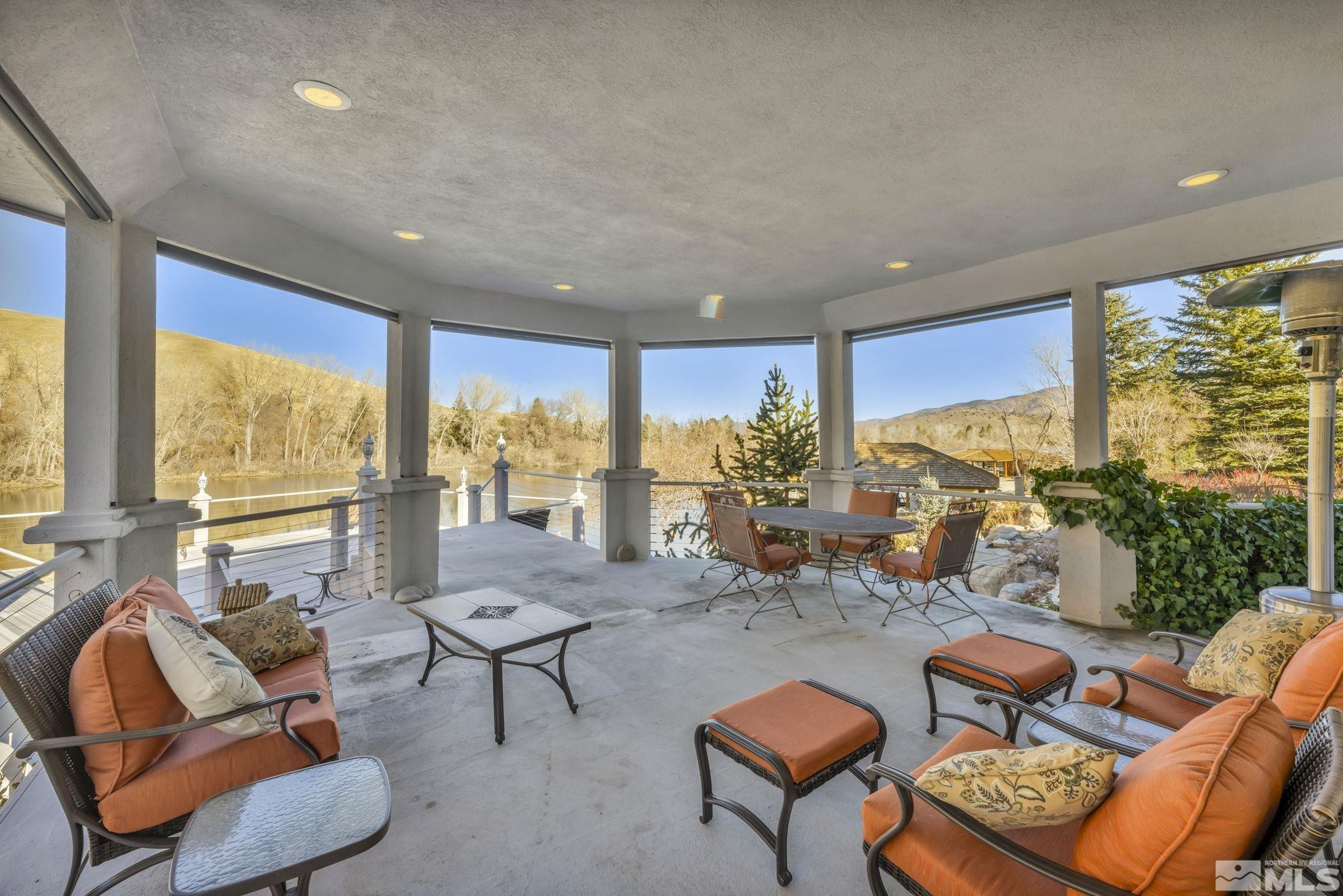 15 Hidden Lake Drive Reno, NV 89521 - Photo 10 of 40 a living room with furniture and a large window