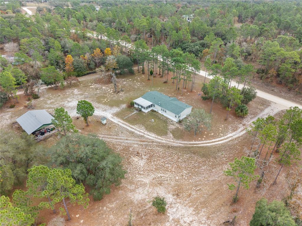 12251 Southeast 66th Place Morriston, FL 32668 - Photo 22 of 55 a view of outdoor space and yard
