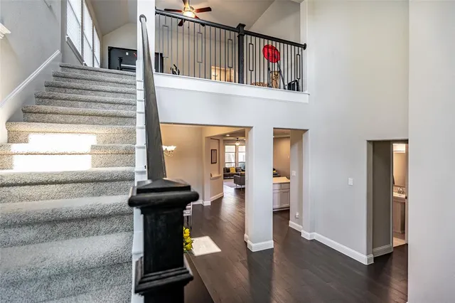 a front view of a house with entryway and wooden floor
