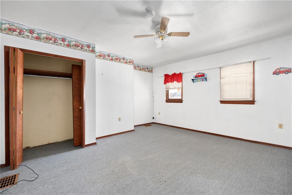 10 Alice Street McKees Rocks, PA 15136 - Photo 12 of 16 a view of a livingroom with toys