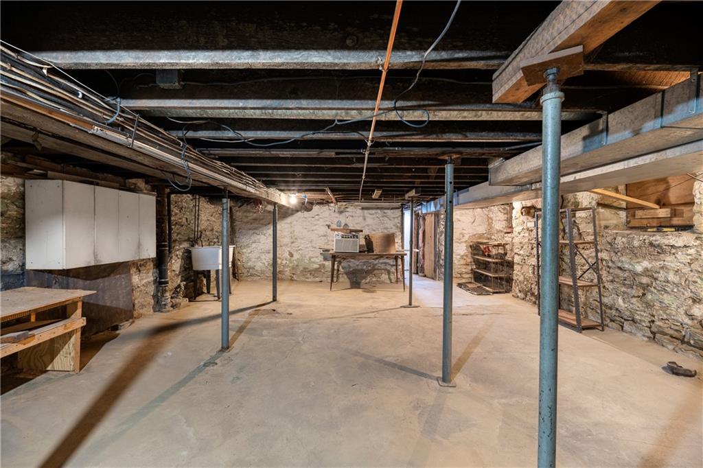 10 Alice Street McKees Rocks, PA 15136 - Photo 14 of 16 a view of a room with wooden floor