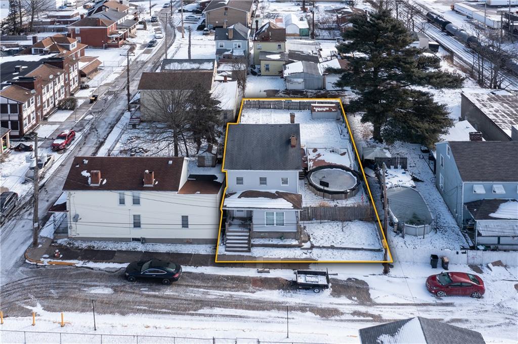 10 Alice Street McKees Rocks, PA 15136 - Photo 15 of 16 an aerial view of a yard with table and chairs