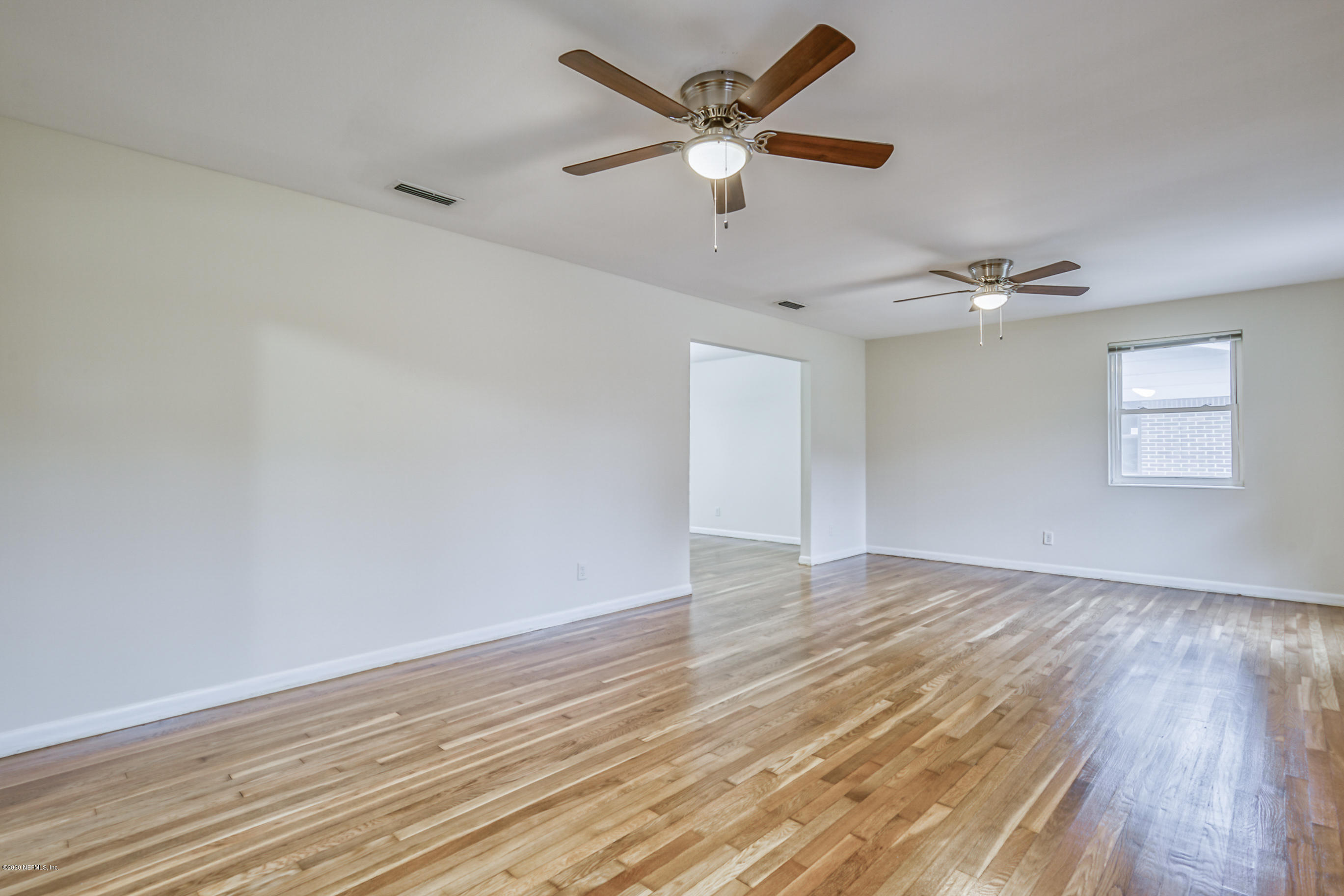 1305 Timber Lane Jacksonville, FL 32211 - Photo 19 of 58 wooden floor in an empty room