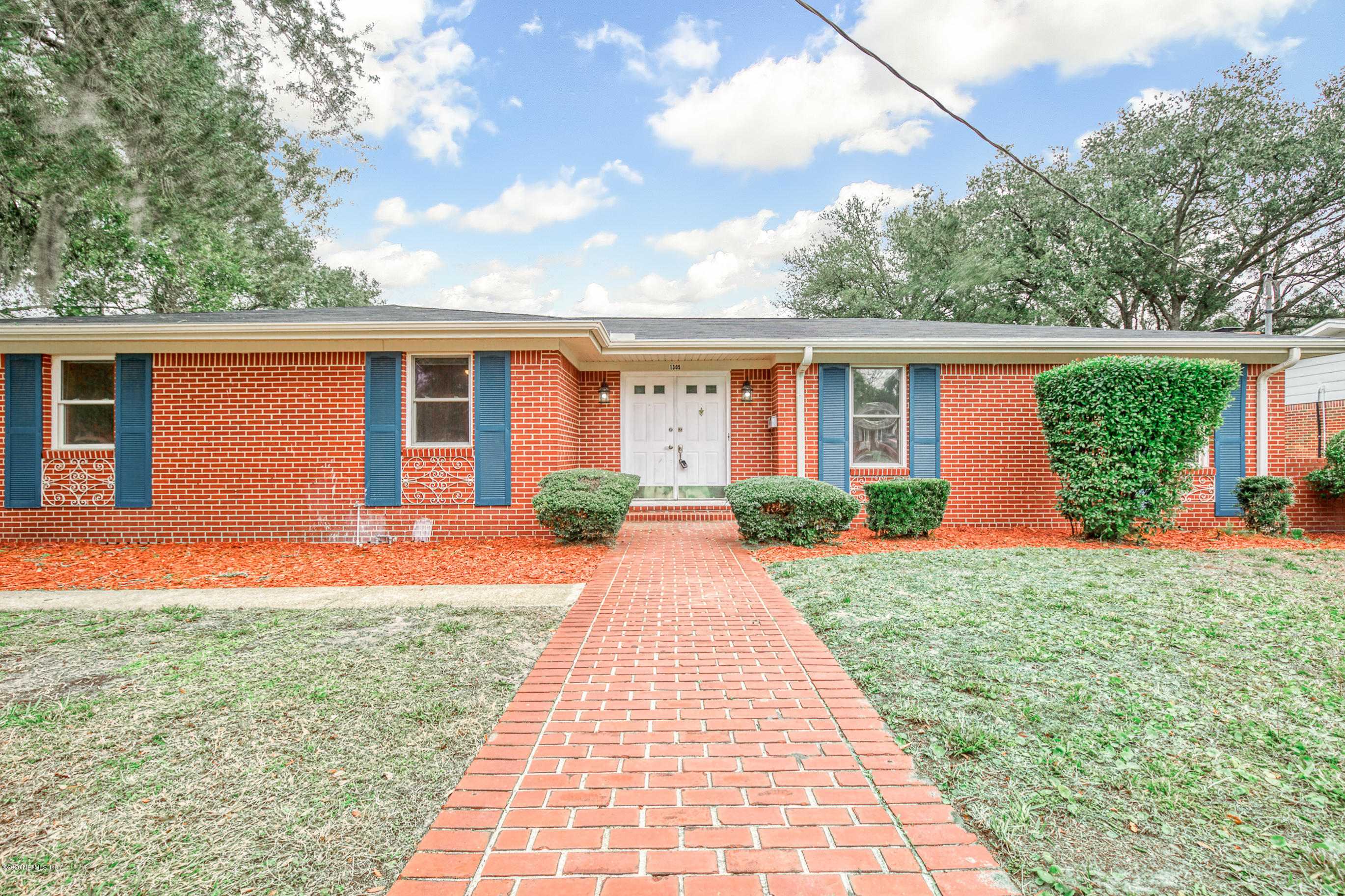 1305 Timber Lane Jacksonville, FL 32211 - Photo 2 of 58 a front view of a house with garden