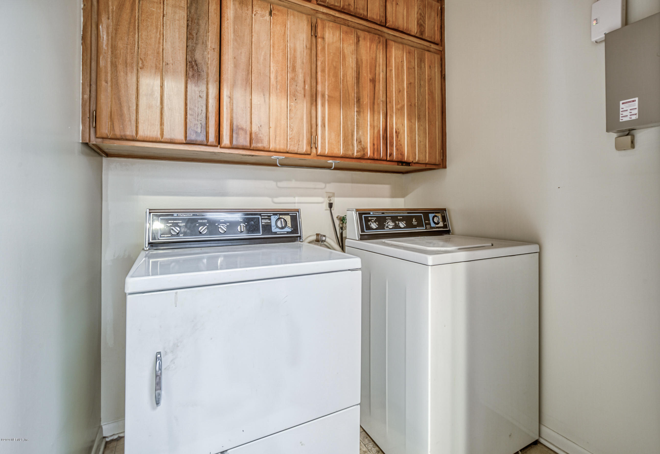 1305 Timber Lane Jacksonville, FL 32211 - Photo 42 of 58 Laundry room with built in cabinets