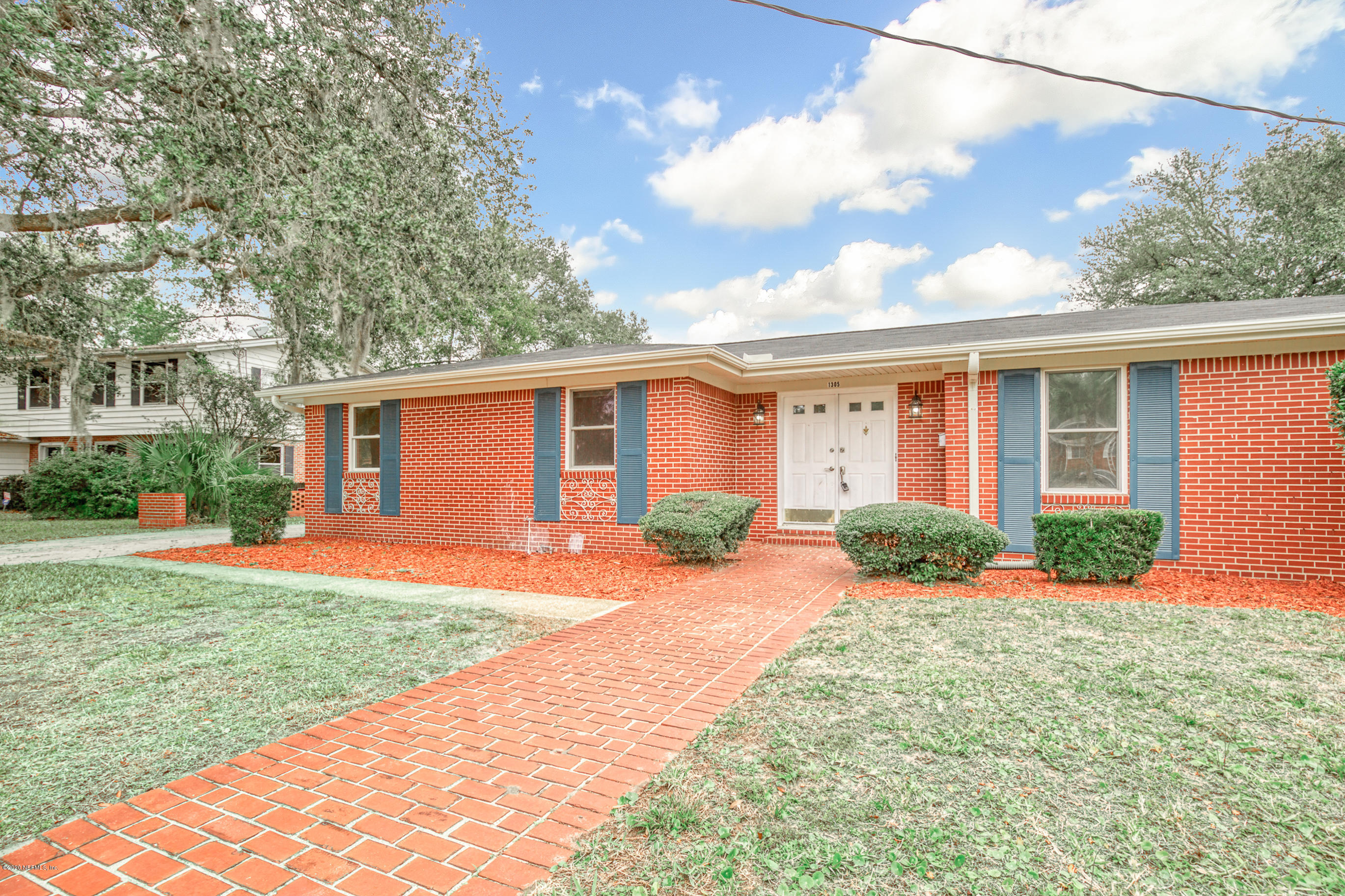 1305 Timber Lane Jacksonville, FL 32211 - Photo 43 of 58 front view of a house with a yard