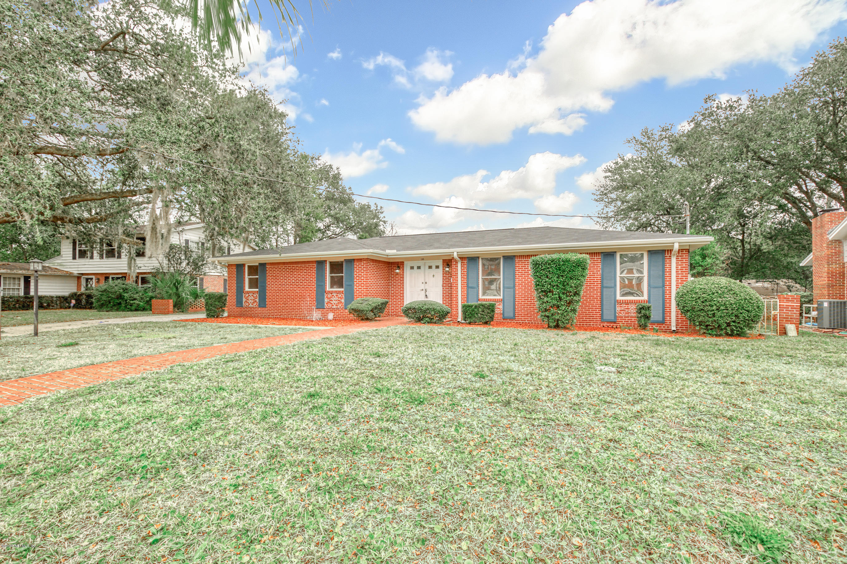 1305 Timber Lane Jacksonville, FL 32211 - Photo 45 of 58 a view of a house with a yard and pathway