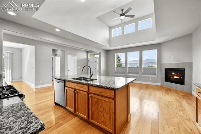 a kitchen with sink and stove