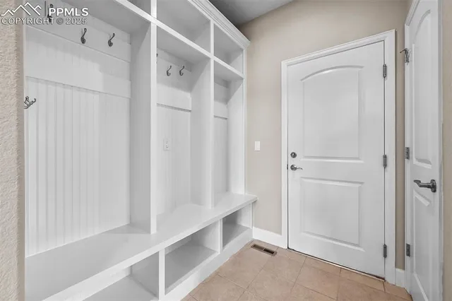 a view of an empty walk in closet