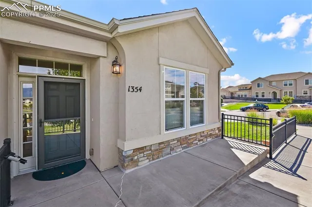 a house view with a garden space
