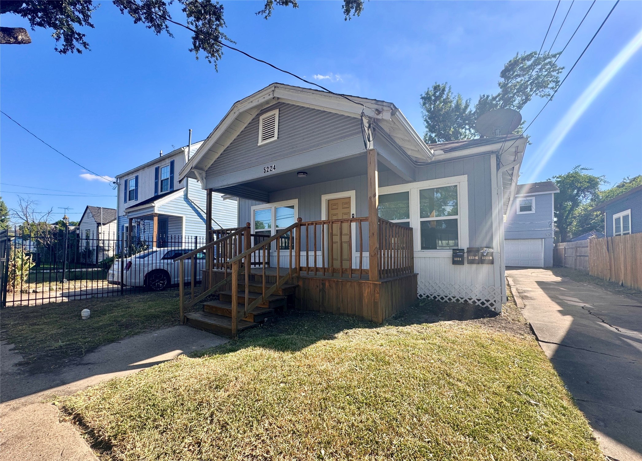 5224 Leeland Street Houston, TX 77023 - Photo 2 of 16 a front view of a house with a yard