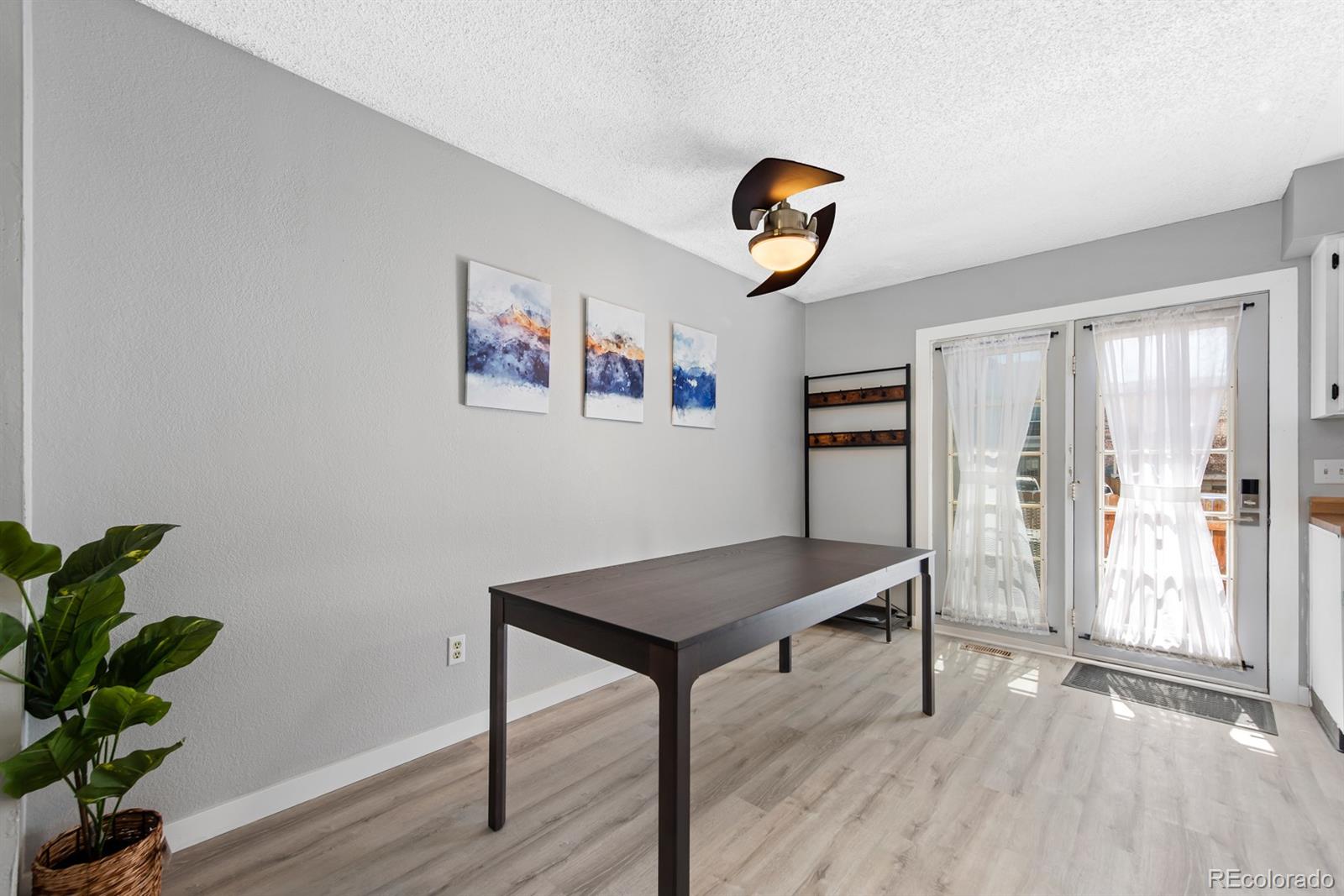 19927 Briarwood Court Parker, CO 80138 - Photo 16 of 29 a view of work space with wooden floor and window