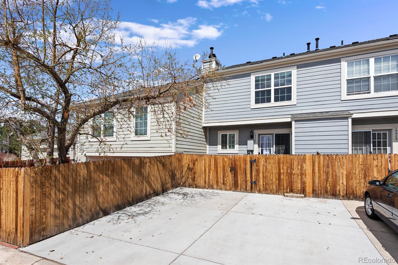 19927 Briarwood Court Parker, CO 80138 - Photo 5 of 29 a view of a house with a backyard