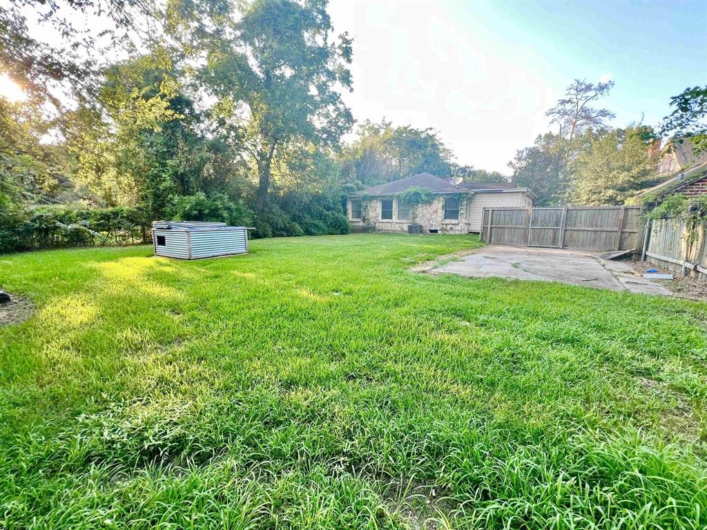 2475 Evalon Avenue Beaumont, TX 77702 - Photo 22 of 23 a view of a house with a yard porch and sitting area