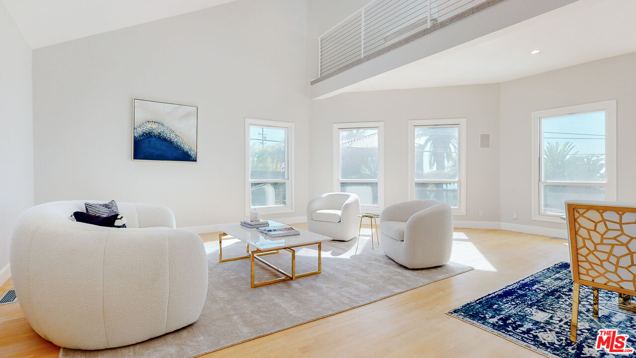 201 Waterview Street Playa del Rey, CA 90293 - Photo 13 of 54 a living room with furniture and wooden floor