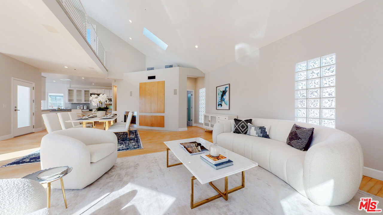 201 Waterview Street Playa del Rey, CA 90293 - Photo 14 of 54 a bedroom with furniture and a large window