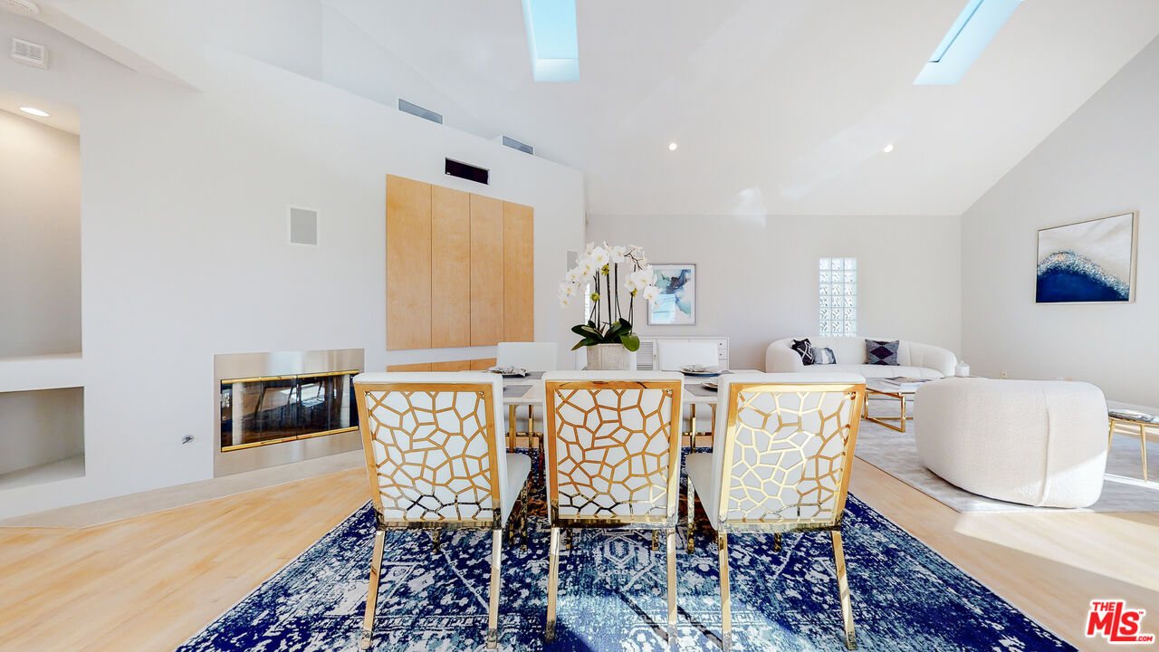 201 Waterview Street Playa del Rey, CA 90293 - Photo 16 of 54 a view of a dining room with furniture and wooden floor
