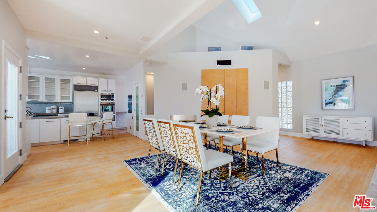 201 Waterview Street Playa del Rey, CA 90293 - Photo 17 of 54 a view of a dining room with furniture and wooden floor