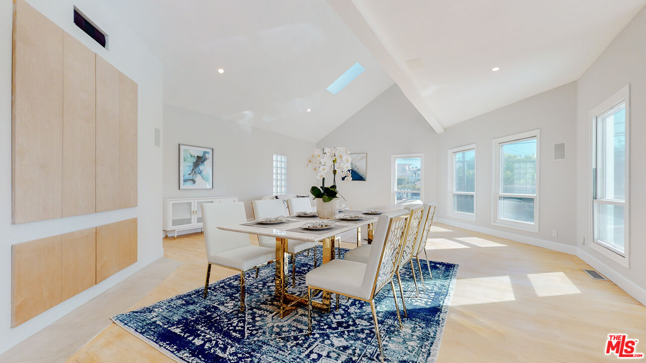 201 Waterview Street Playa del Rey, CA 90293 - Photo 18 of 54 a dining room with a table and chairs