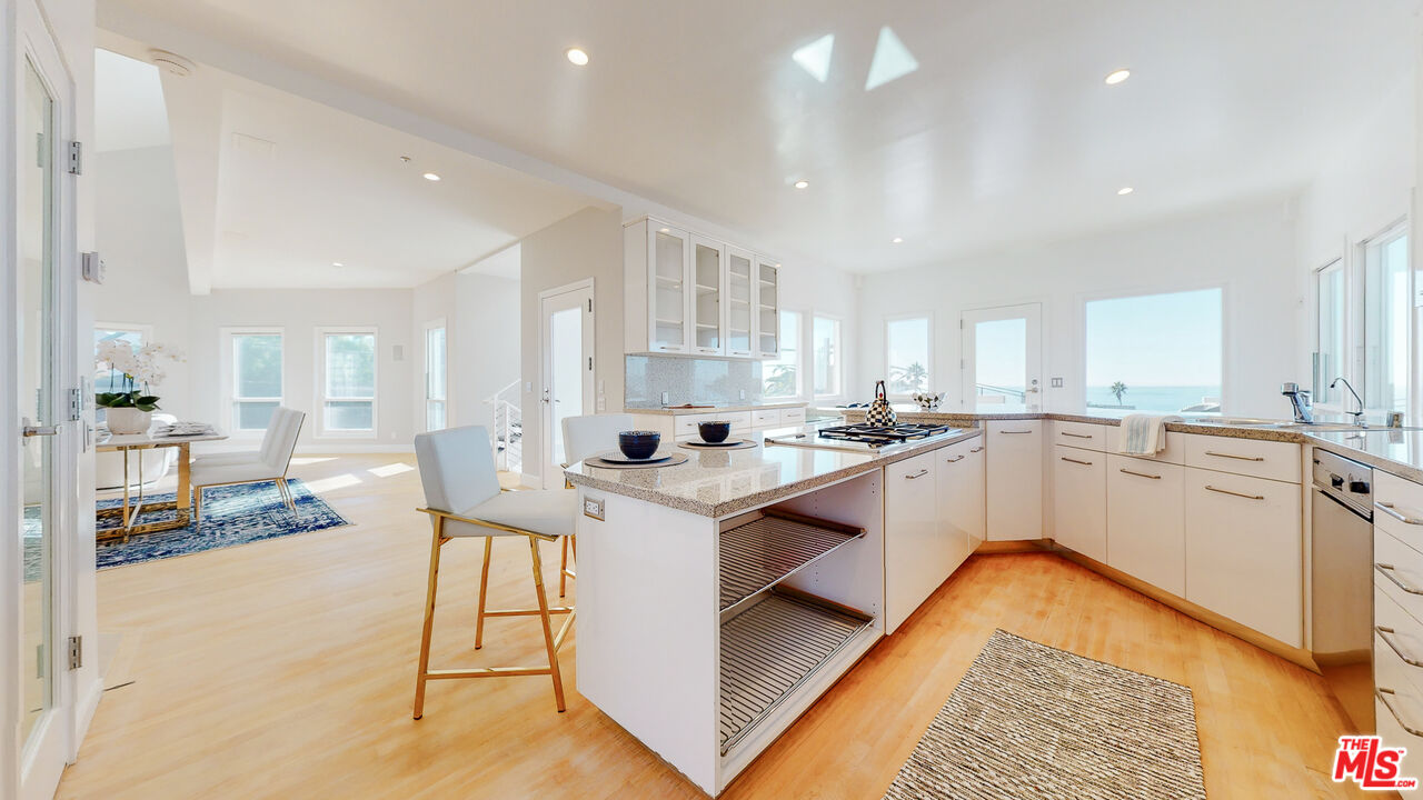 201 Waterview Street Playa del Rey, CA 90293 - Photo 23 of 54 a kitchen with a sink cabinets and counter space