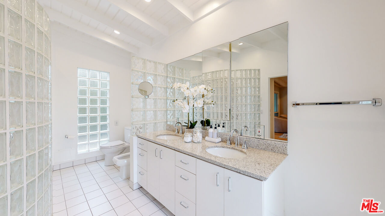 201 Waterview Street Playa del Rey, CA 90293 - Photo 39 of 54 a bathroom with a double vanity sink toilet and shower