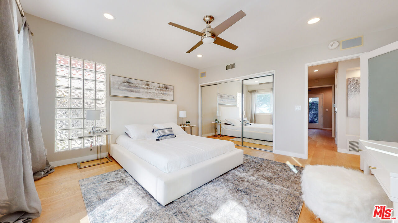 201 Waterview Street Playa del Rey, CA 90293 - Photo 44 of 54 a bedroom with a bed and a large window