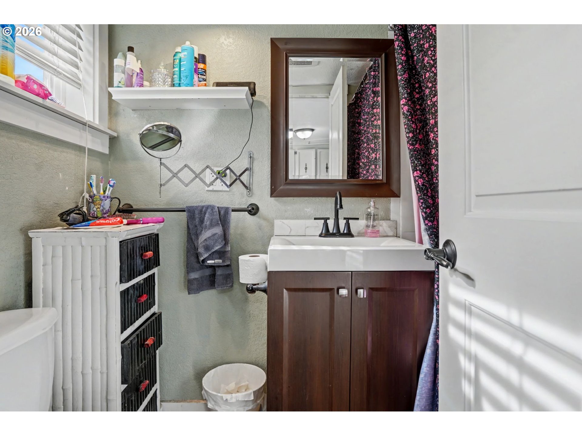 213 Mill Street Silverton, OR 97381 - Photo 12 of 25 a bathroom with a sink mirror and vanity