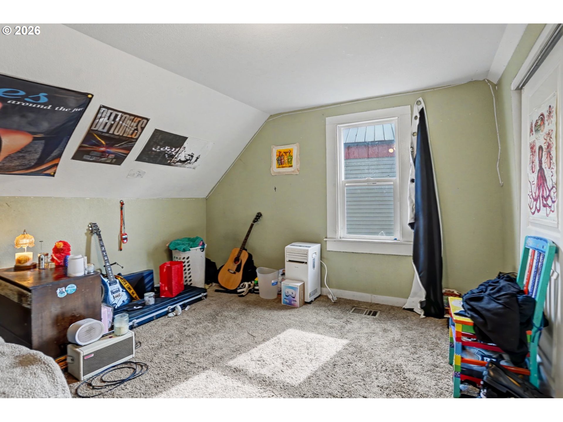 213 Mill Street Silverton, OR 97381 - Photo 16 of 25 a living room with baby toys