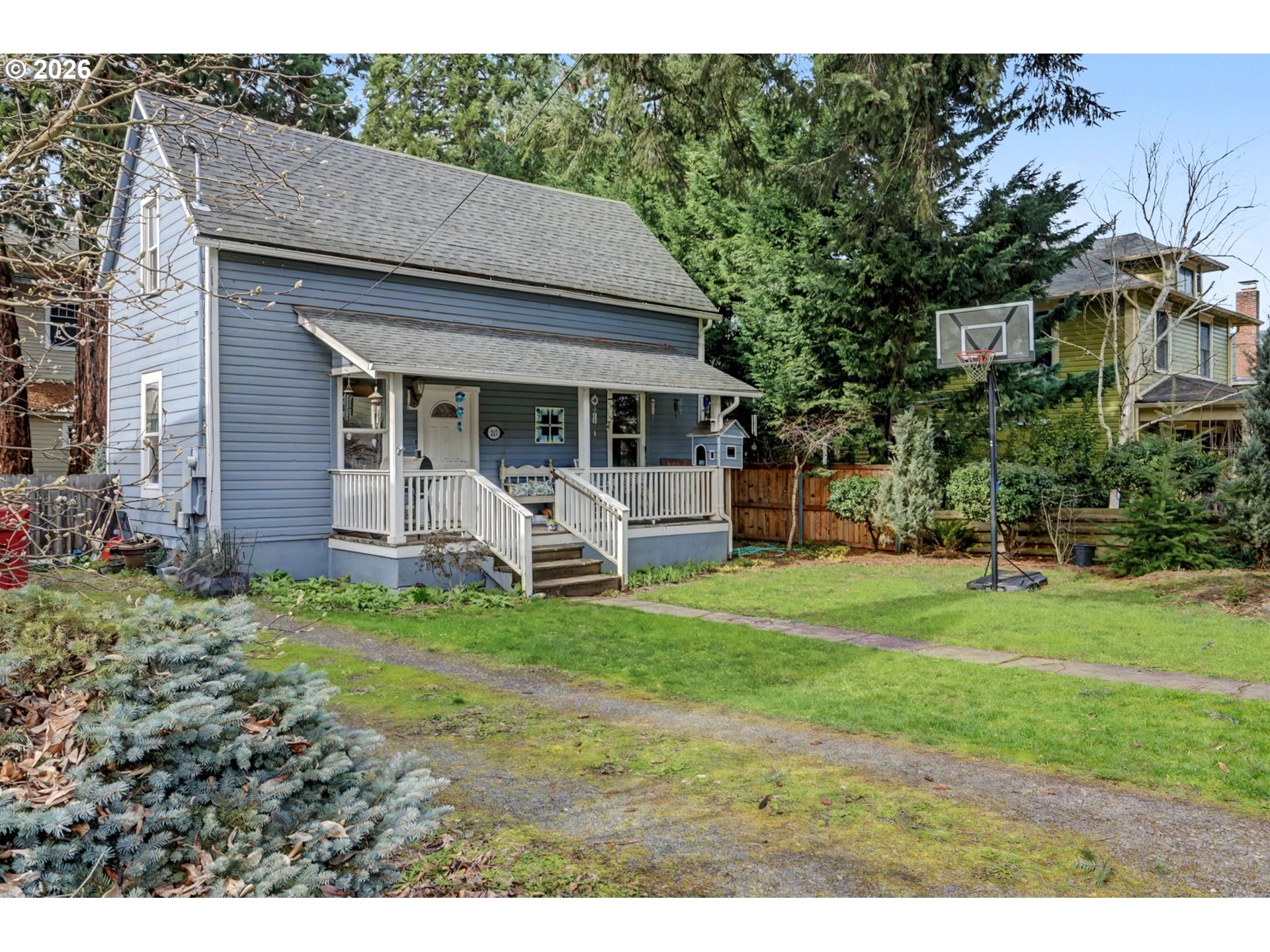 213 Mill Street Silverton, OR 97381 - Photo 2 of 25 a view of a house with backyard