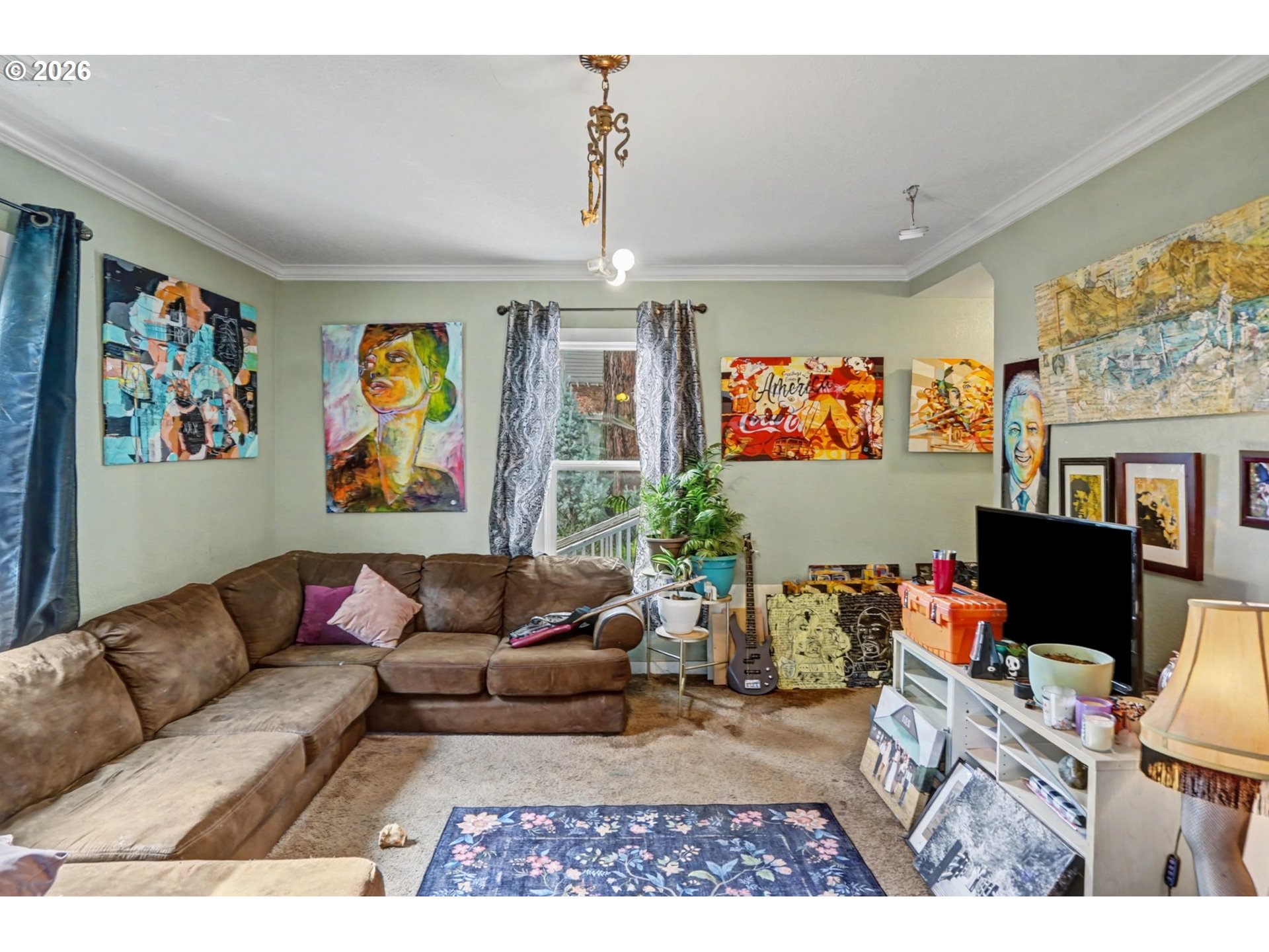 213 Mill Street Silverton, OR 97381 - Photo 6 of 25 a living room with furniture and a flat screen tv