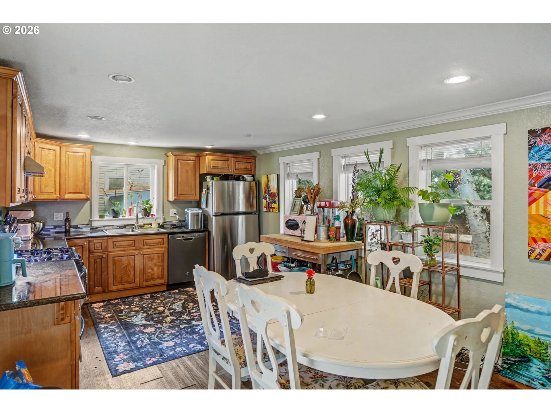 213 Mill Street Silverton, OR 97381 - Photo 9 of 25 a living room with dining table and a large window