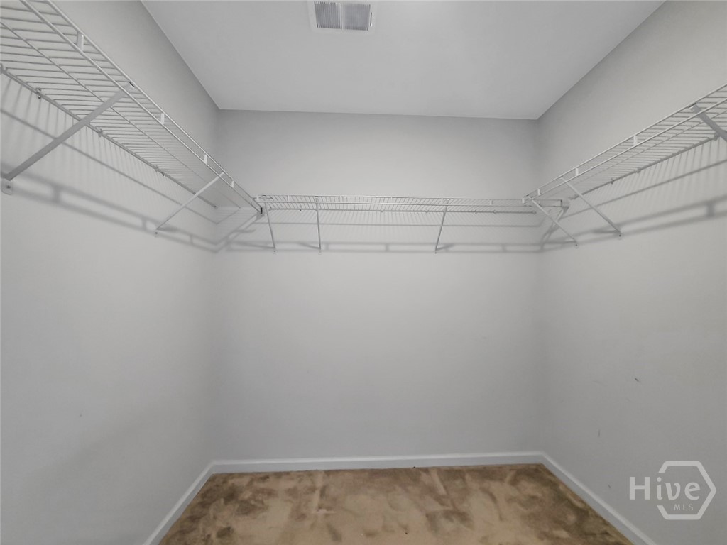 109 Barbados Circle Guyton, GA 31312 - Photo 26 of 46 PRIMARY BEDROOM WALK-IN CLOSET