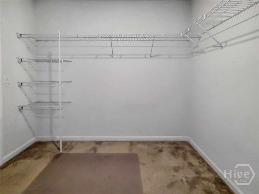109 Barbados Circle Guyton, GA 31312 - Photo 27 of 46 PRIMARY BEDROOM WALK-IN CLOSET
