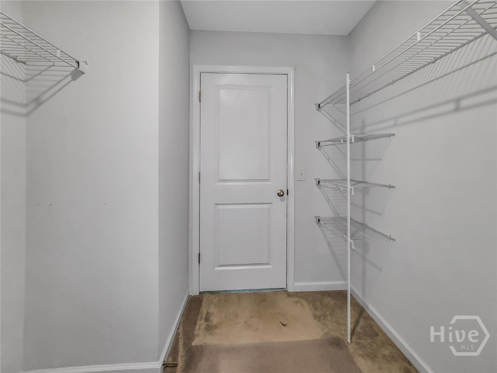 109 Barbados Circle Guyton, GA 31312 - Photo 28 of 46 PRIMARY BEDROOM WALK-IN CLOSET VIEW 2