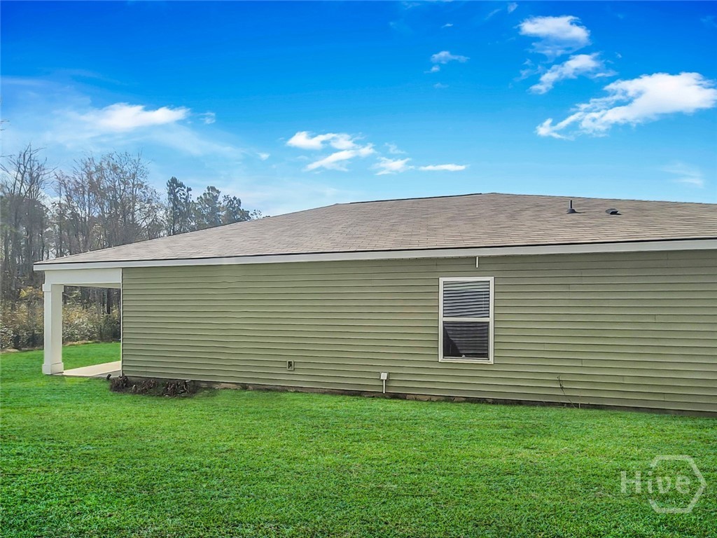 109 Barbados Circle Guyton, GA 31312 - Photo 5 of 46 SIDE VIEW