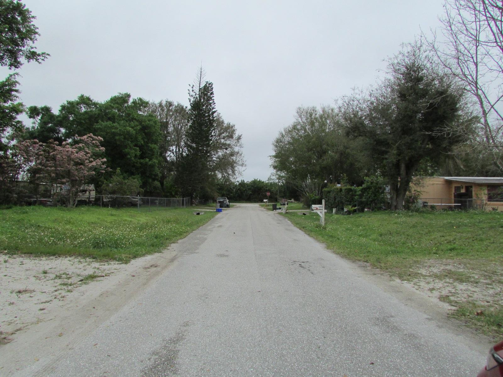 1213 Southwest Pinetree Trail Stuart, FL 34997 - Photo 6 of 11 Other side street view